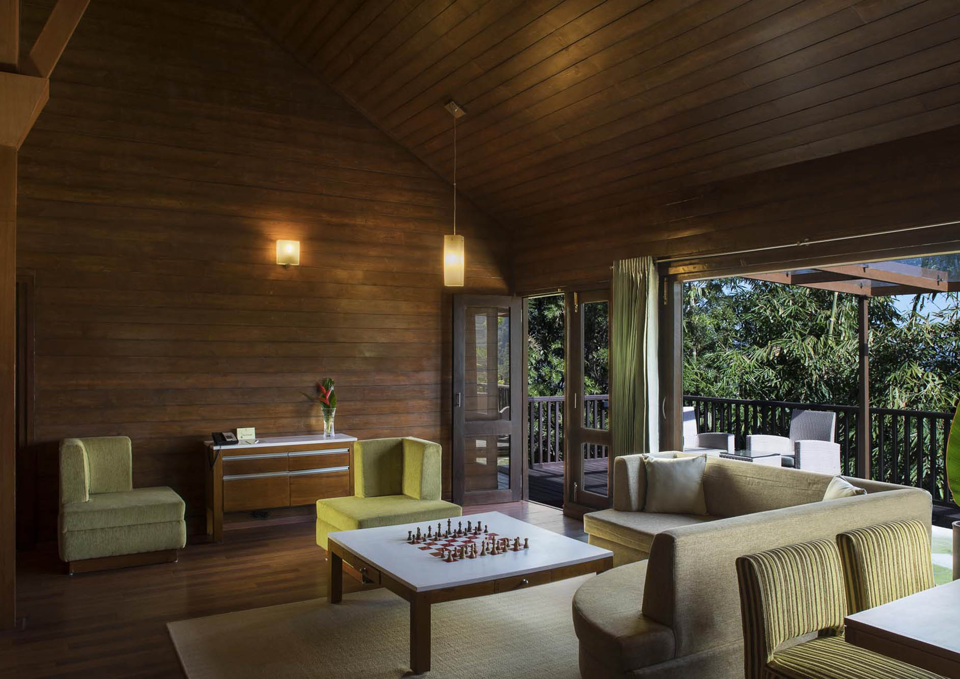 luxury-cottage-interior-with-chairs-and-sofa-with-nature-view