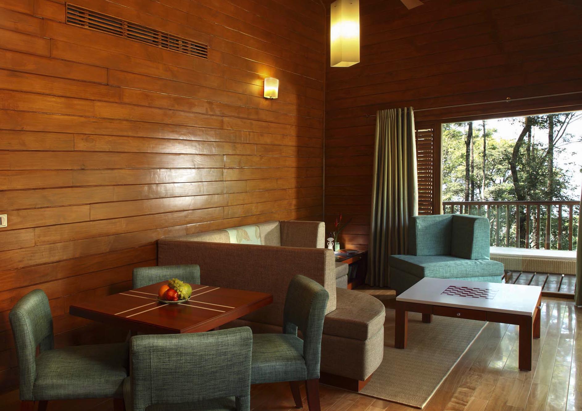 luxury-cottage-interior-with-chair-and-sofa-with-nature-view