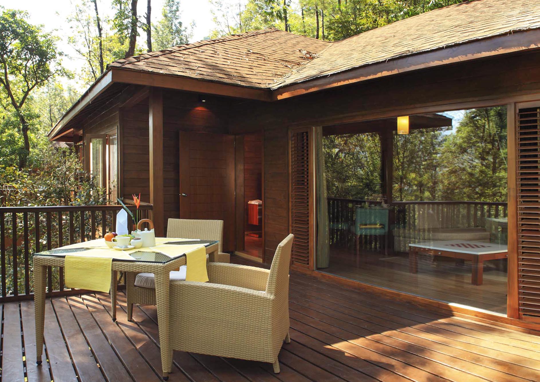 luxury-cottage-balcony-with-chair-and-nature-view