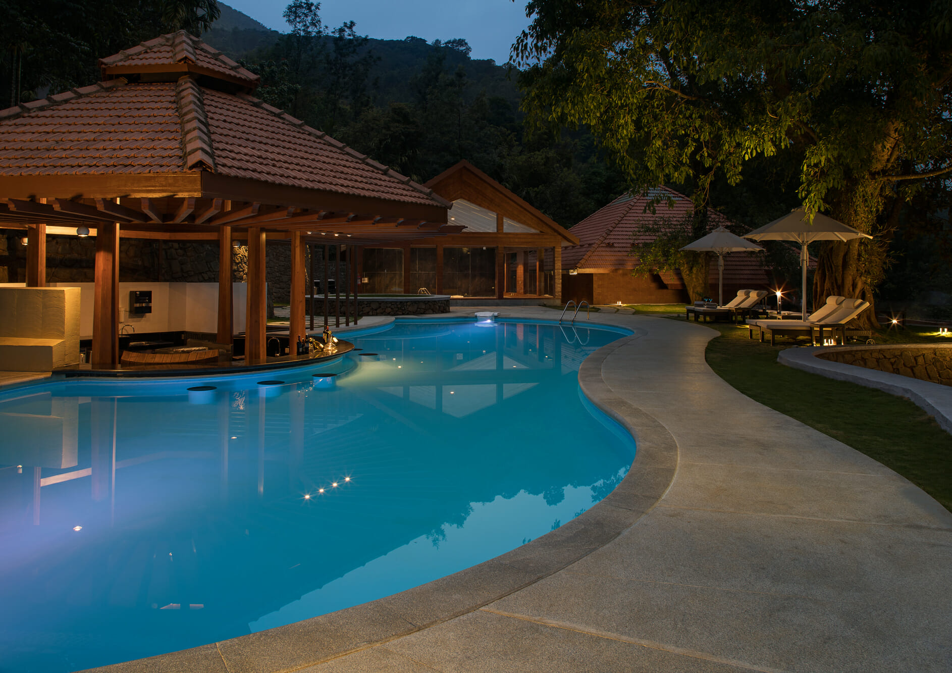 Swimming-pool-in-open-air-with-bar-and-relax-seats